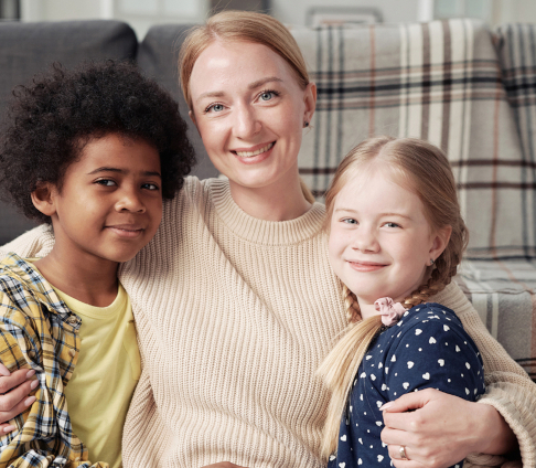 happy-mother-with-adopted-children-Ellis Family Law in Cary NC