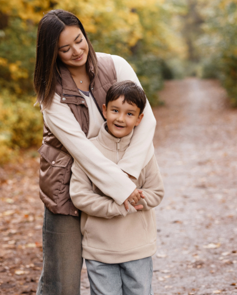 mother-and-son-playing-together-on-autumn-forest-Ellis Family Law in Cary NC