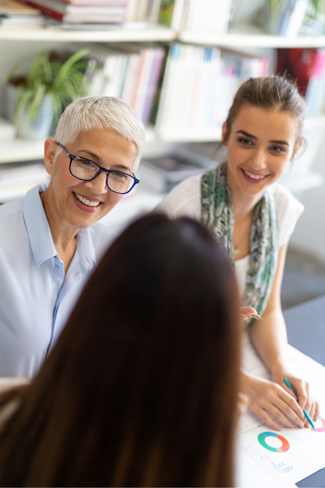 portrait-of-happy-success-business-women-talking