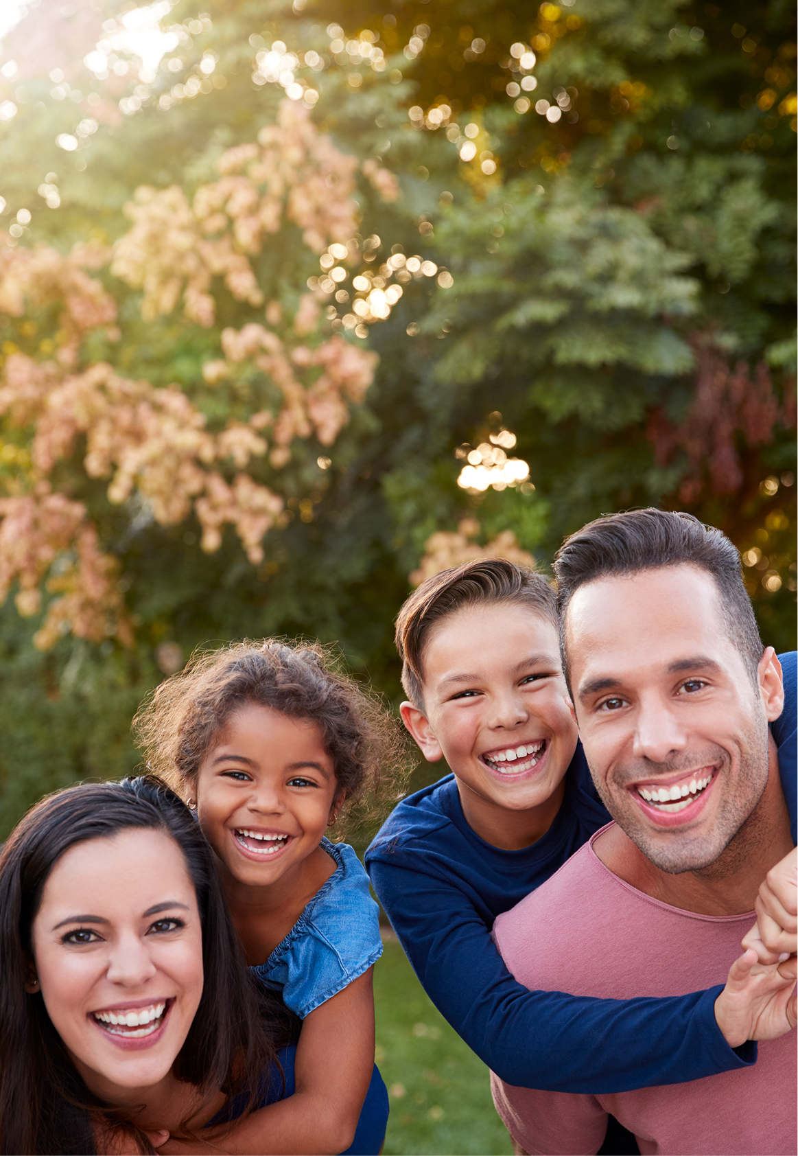 portrait-of-smiling-hispanic-family-with-parents