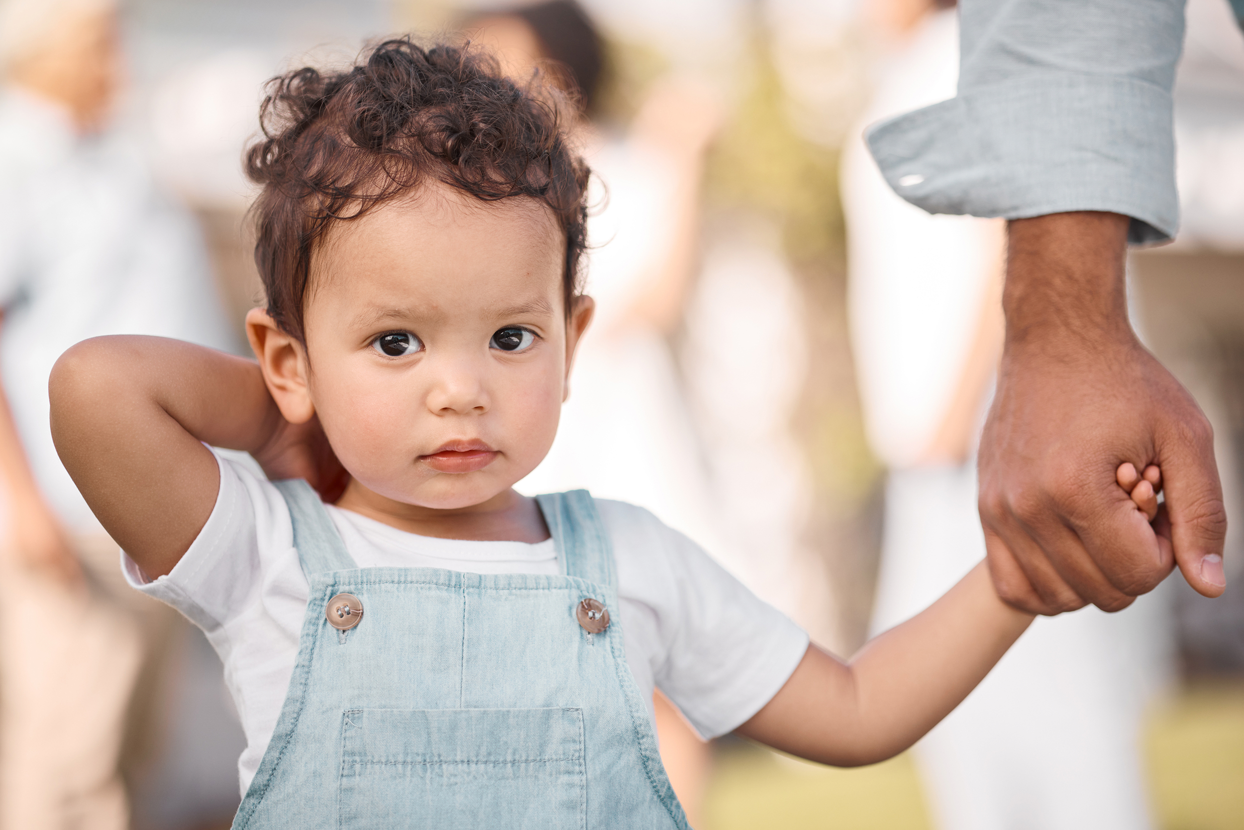 portrait-parent-or-face-of-child-holding-hands-iEllis Family Law in Cary NC