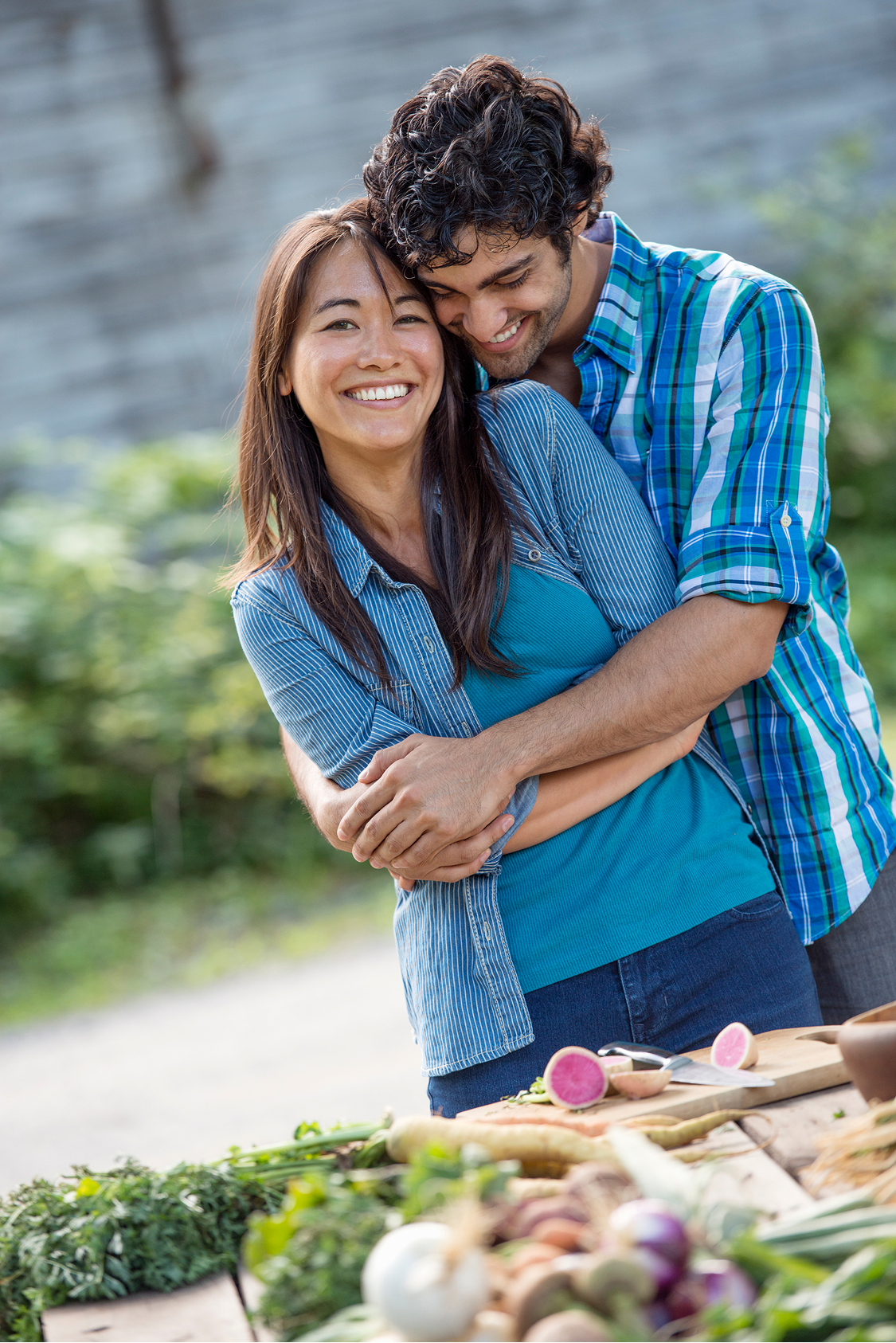 two-people-embracing-in-a-garden-prenuptial-agreement-attorney-cary-nc