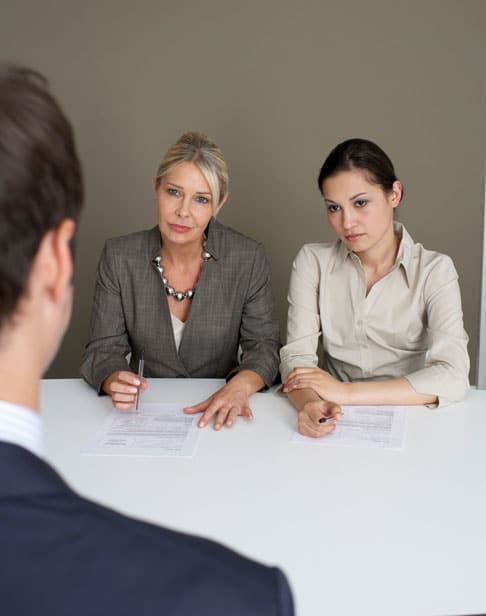 2-businesswomen-interviewing-man-alimony-ellis-family-law-chapel-hill
