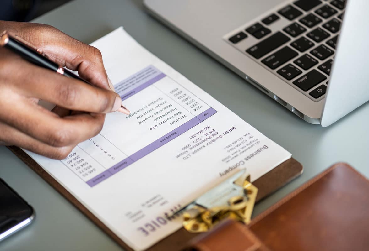 closeup-of-business-man-checking-chapel-hill-property-division-laywer-ellis