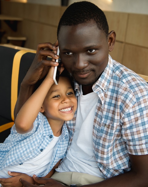 happy-african-american-father-and-son-raleigh-visitation-lawyer-ellis-family
