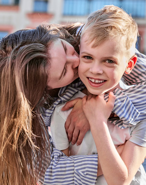 happy-woman-and-child-embrace-chapel-hill-child-support-ellis-family