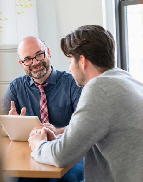 two-professional-colleagues-in-an-office-raleigh-divorce-lawyers-ellis-family-law2