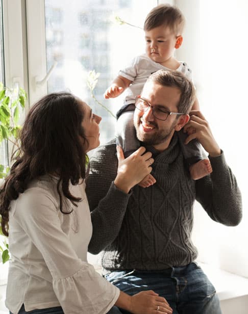 happy-family-with-a-little-boy-ichild-visitation-wake-forest-ellis-family-lawyers