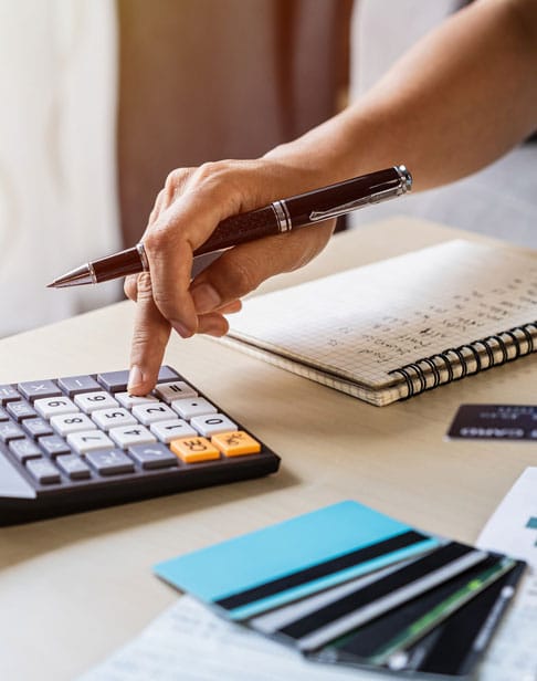 young-woman-checking-bills-property-division-lawyers-ellis-family-wake-forest