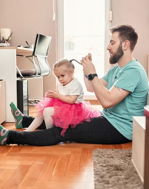 father-braiding-hair-of-his-daughter-Pittsboro-child-support-ellis-family-law