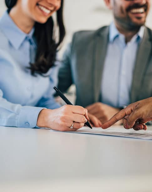 signing-documents-prenup-lawyers-pittsboro
