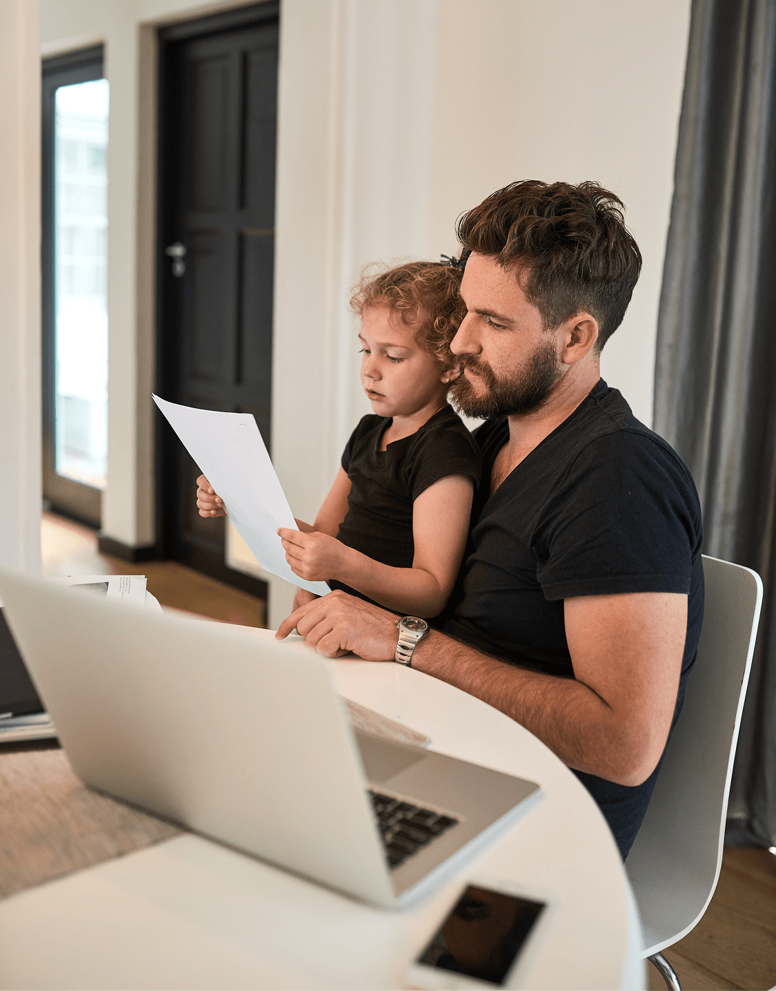 dad-with-daughter-reading-child-support-holly-springs