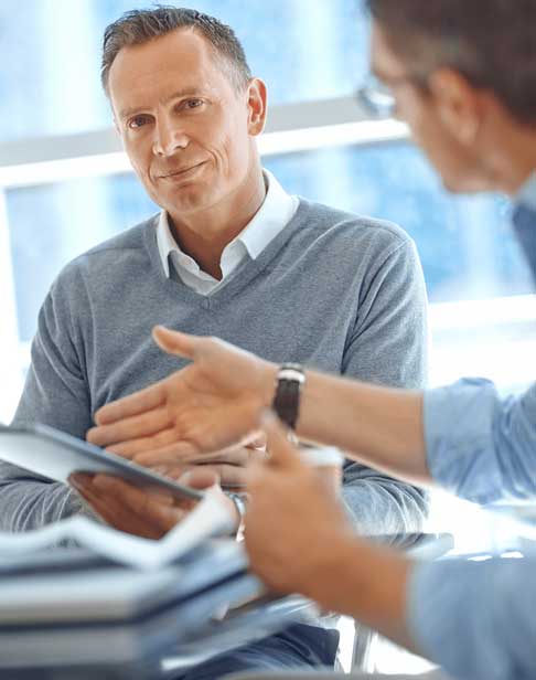 older-man-discussing-with-attorney-garner-divorce-law-firm