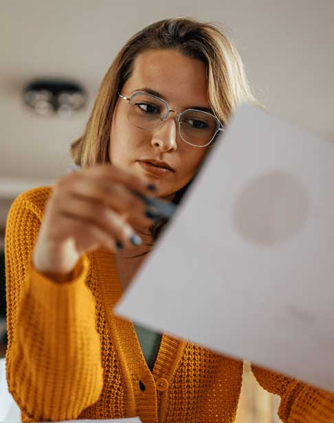 single-woman-reviewing-divorce-papers-carborro