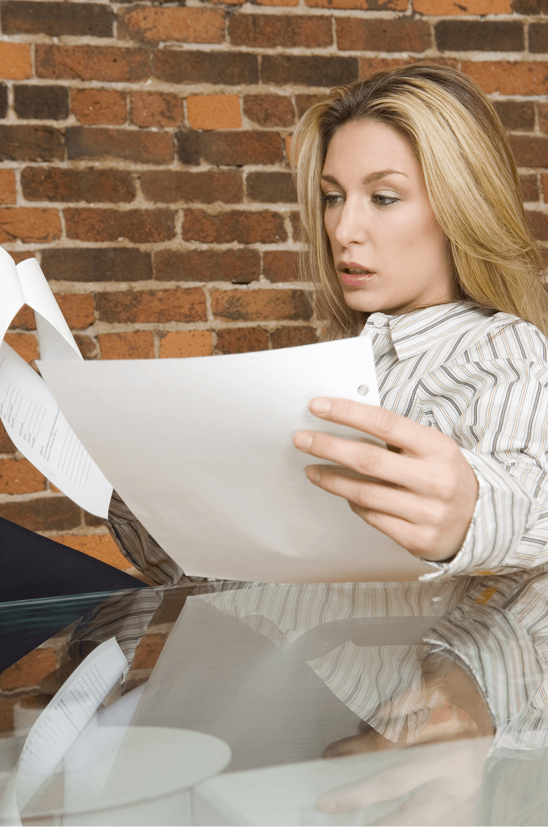 woman-reading-papers-fuquay-varina-divorce-law-firm