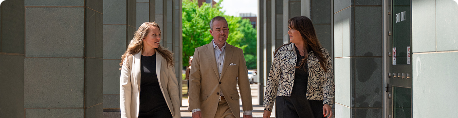 Ellis Family Law Partners Board Certified Specialists walking outside cropped