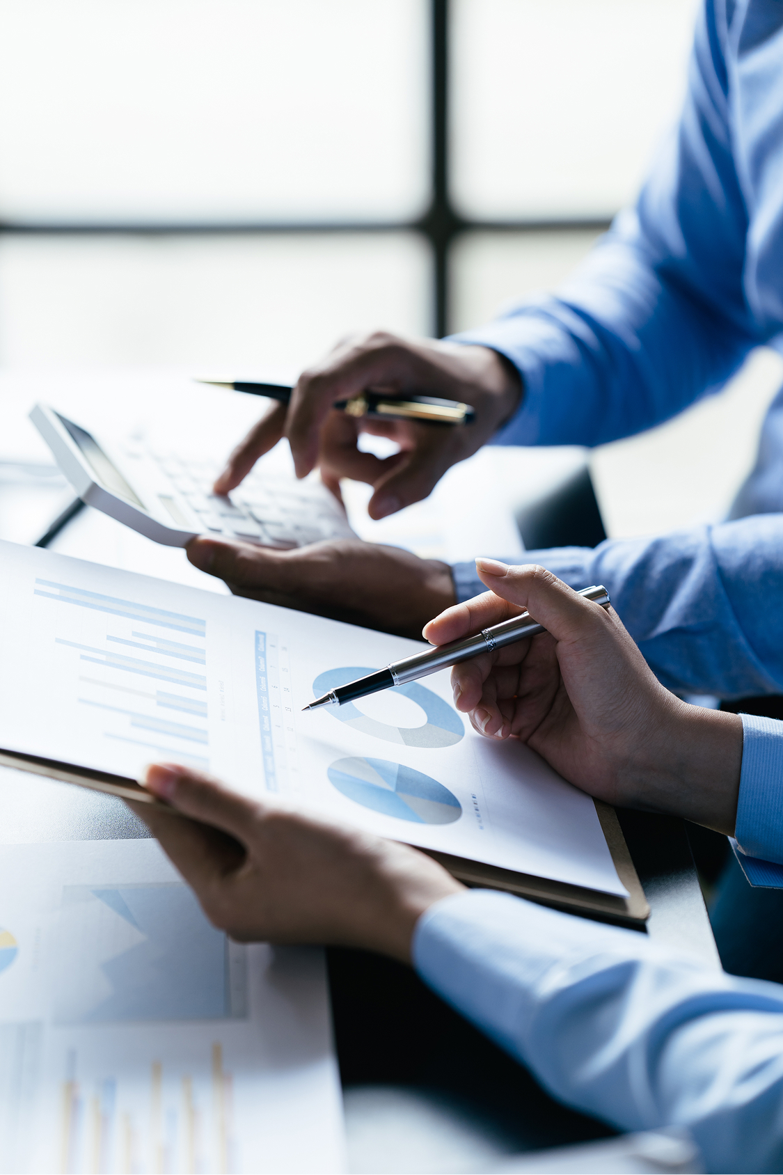 Raleigh High-Asset Divorce Lawyer meeting about financial reports