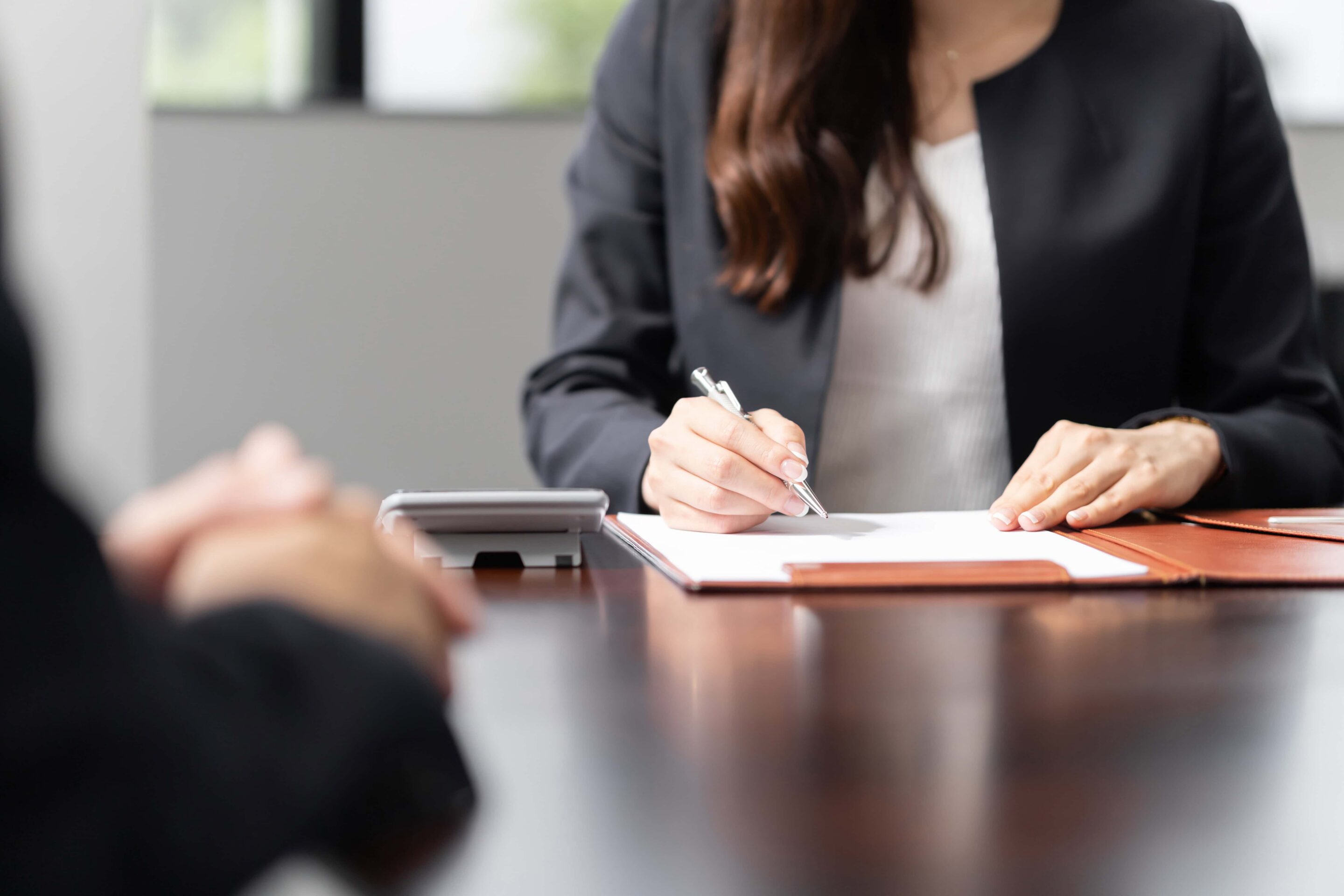 business-meeting-wooden-desk_durham_divorce_lawyer