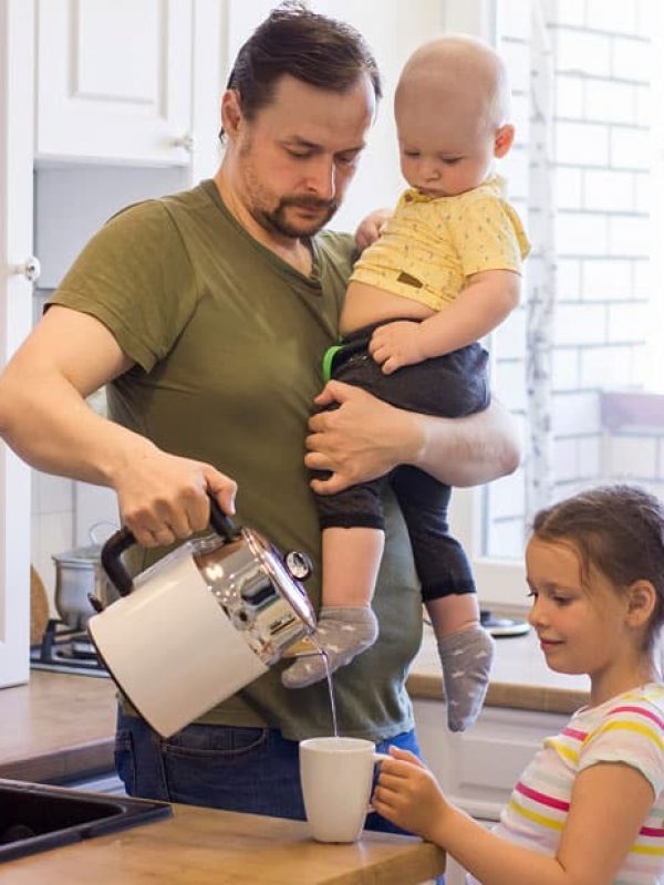father-holds-his-little-baby-schild-visitation-lawyer-pittsboro